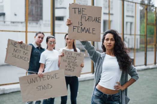 Unity of people. Group of feminist women have protest for their rights outdoors photo