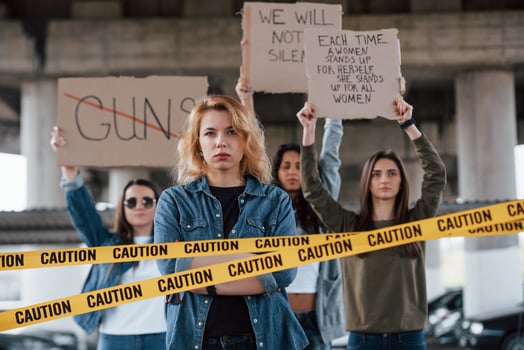 Hands is up. Group of feminist women have protest for their rights outdoors photo