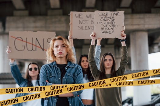 Leader of the team. Group of feminist women have protest for their rights outdoors photo