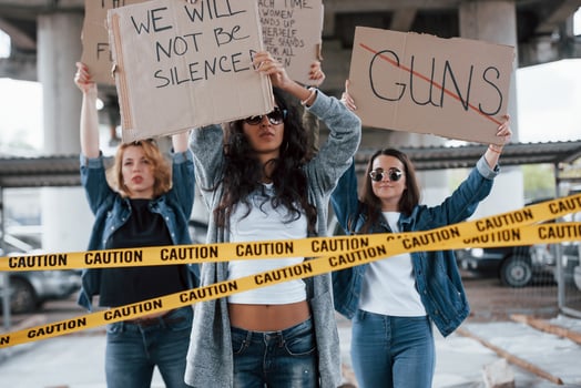 Promote the requirements. Group of feminist women have protest for their rights outdoors photo