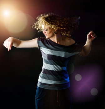 young woman dancing photo
