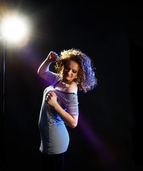 young woman dancing photo