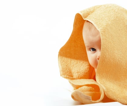 baby in yellow towel photo