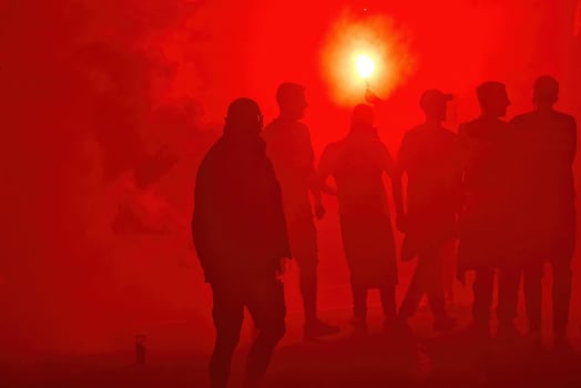 red smoke black people silhouette protest demonstration photo
