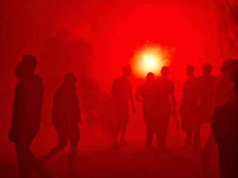 red smoke black people silhouette protest demonstration photo