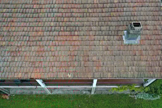 italiy tile roof chimney detail drone view photo