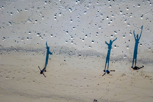 human shadows on the beach Maldives aerial view panorama landscape photo