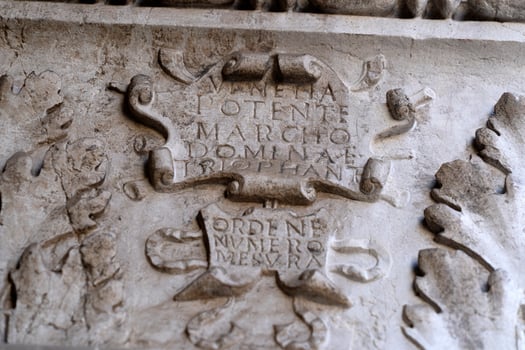 VENICE, ITALY - SEPTEMBER 15 2019 - doge ducal palace capital of column wayside sculpture detail photo