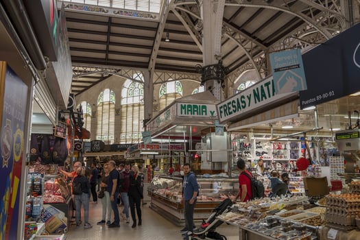 VALENCIA, SPAIN - MAY 3 2022 - The historic market full of customers photo