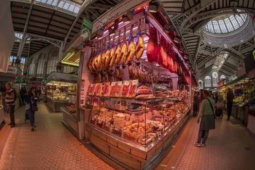 VALENCIA, SPAIN - MAY 3 2022 - The historic market full of customers photo