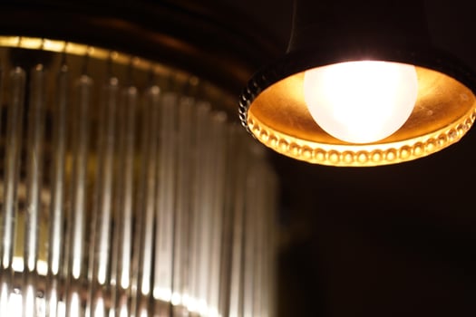 old liberty lamp isolated on black photo