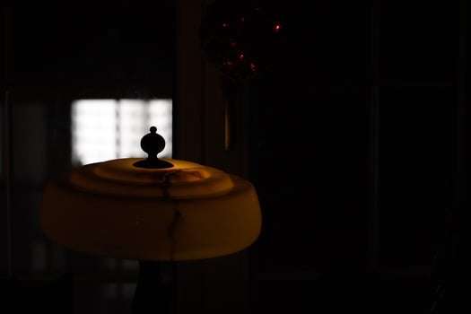 old liberty lamp isolated on black photo