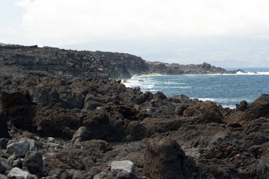 Lajido village Pico Island Azores black lava houses red windows photo