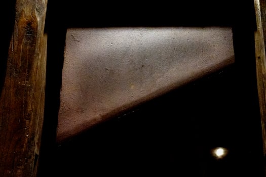 Gullotine blade isolated on black photo