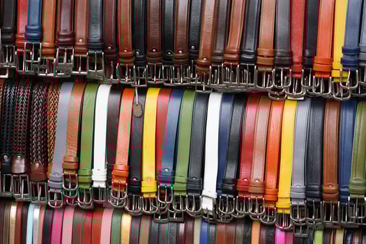 leather belts in italian market for sale photo