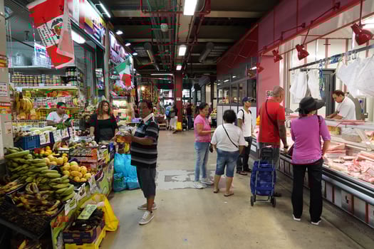 FLORENCE, ITALY - SEPTEMBER 1 2018 - People buying at old city market photo