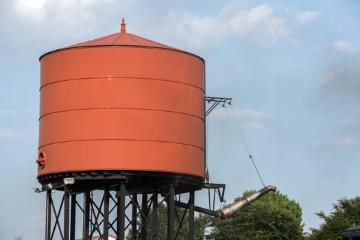 old steam engine iron train water tank photo