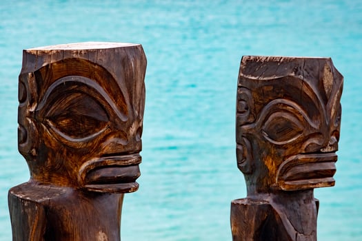 tiki in bora bora french polynesia blue lagoon turquoise crystal water photo