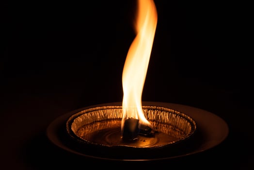 red flame on black background photo