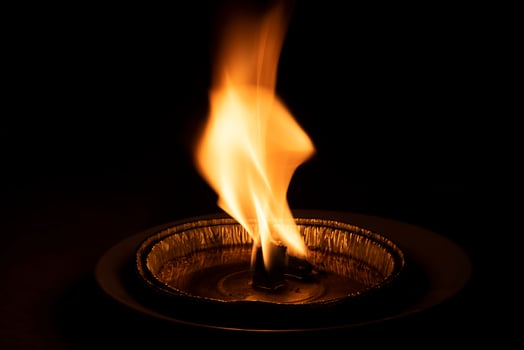 red flame on black background photo