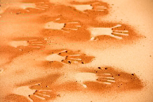 hand shape on sand like aboriginal art style photo