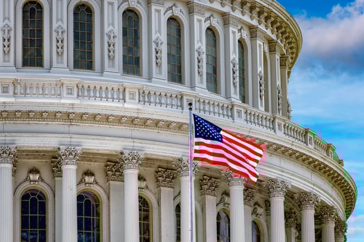 Washington DC Capitol on cloudy sky photo