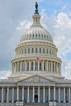 Washington DC Capitol detail on cloudy sky photo
