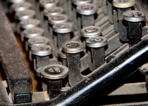 Old Typewriter shift key detail covered by dust photo