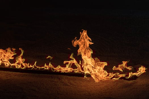Orange Flames on black background photo