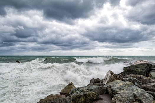 sea in tempest on rocks photo