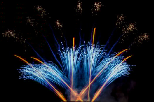 happy new year real fireworks on black photo