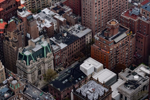 new york manhattan skyscrapers roofs and water tower photo