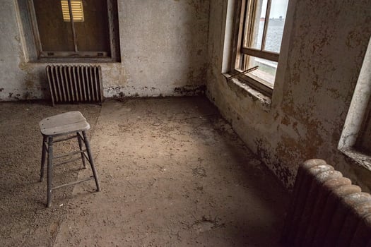 Statue of liberty view from ellis island abandoned psychiatric hospital photo
