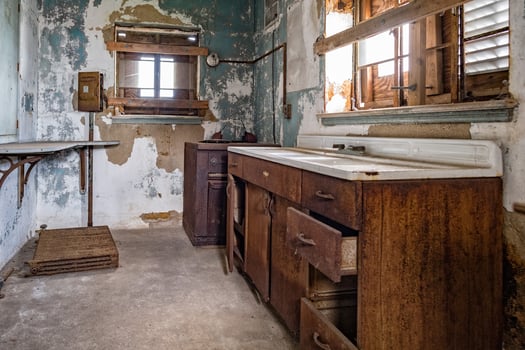 ellis island abandoned psychiatric hospital interior rooms photo