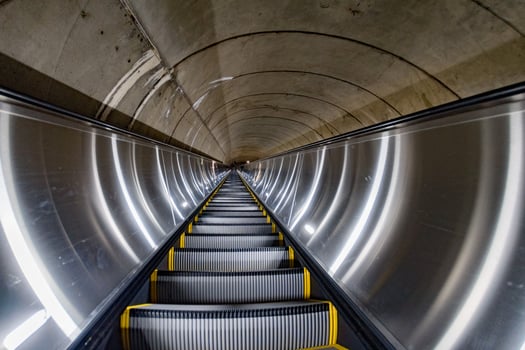 Underground Metro subway moving escalator photo