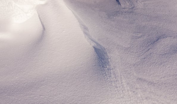 Deep snowdrifts close up photo