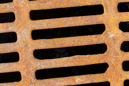sewer grating, close up photo