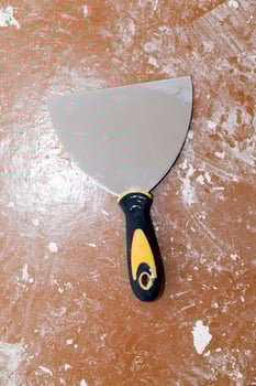 metal spatula on the floor photo