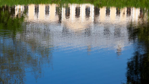 Reflection of a yellow building photo