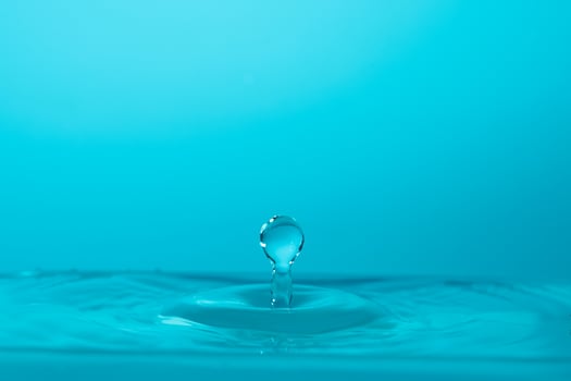 Water drop falling down. photo