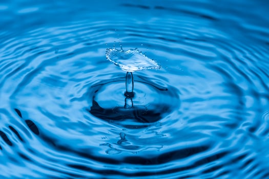 Water drop falling down. photo