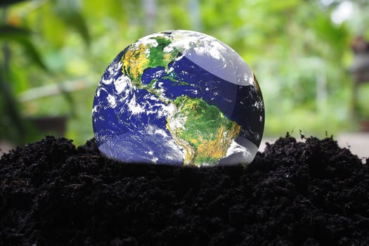 The concept of loving the earth and the environment. globe on earth photo