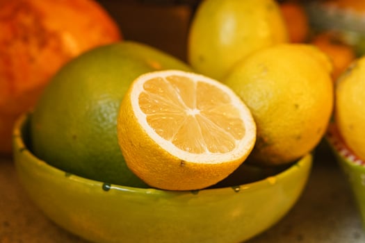 a caterpillars with citrus fruits, including grapefruit and lemons photo