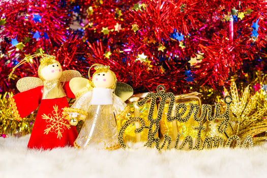 Chrismas doll with Christmas ornaments and decorations photo