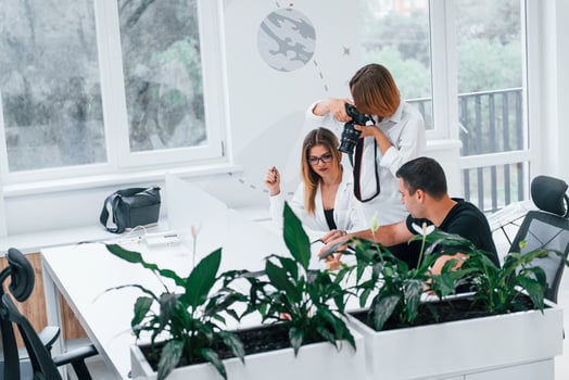 Group of business people in formal clothes indoors in the office photo
