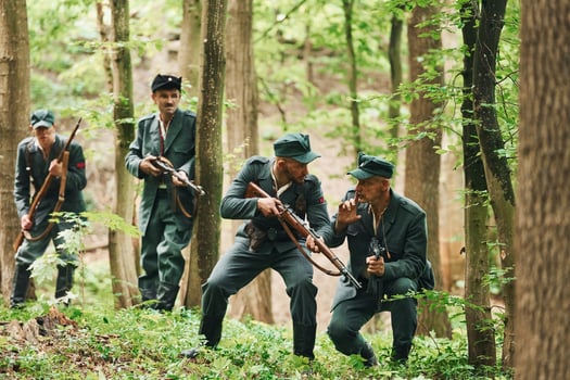 TERNOPIL, UKRAINE - June 2020 UPA Ukrainian Insurgent Army movie filming. Pictures of backstage. Young and old soldiers with weapons is attacking photo