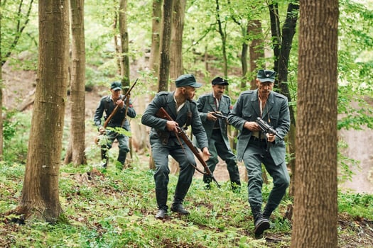 TERNOPIL, UKRAINE - June 2020 UPA Ukrainian Insurgent Army movie filming. Pictures of backstage. Young and old soldiers with weapons is attacking photo