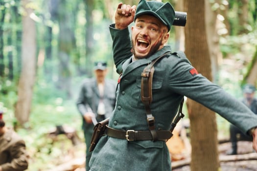 TERNOPIL, UKRAINE - June 2020 UPA Ukrainian Insurgent Army movie filming. Pictures of backstage. Front view of soldier that throws grenade photo