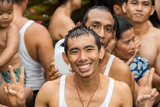 PURA TIRTA EMPUL, BALI, INDONESIA - AUGUST 17, 2016 - Balinese people at the temple for full moon celebration photo