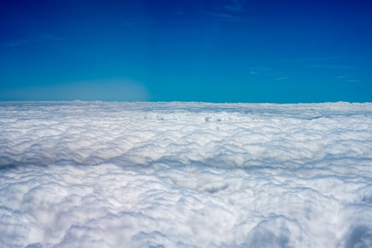 clouds in the sky airplane photo